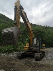 Caterpillar 323 DL tracked excavator
