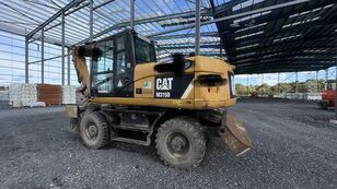 Caterpillar M315D wheel excavator
