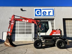 O&K MH City wheel excavator